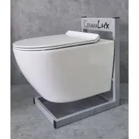 Унитаз подвесной CeramaLux 2196-2 безободковый, с сиденьем микролифт, белый