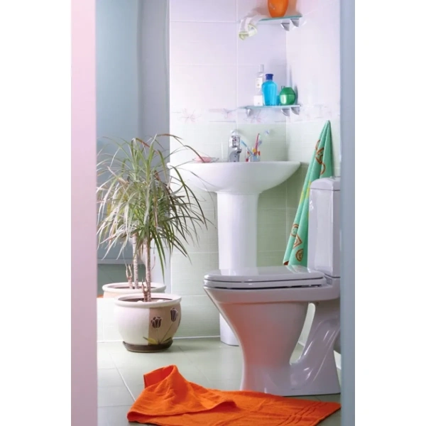 Унитаз-компакт Sanita Аттика эконом WC.CC/Attica/1-P/WHT.G/S1 косой выпуск, с сиденьем полипропилен, белый